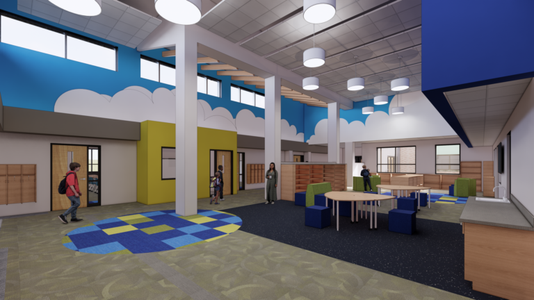 Commons area with clerestory windows, fun colors, and wood accents